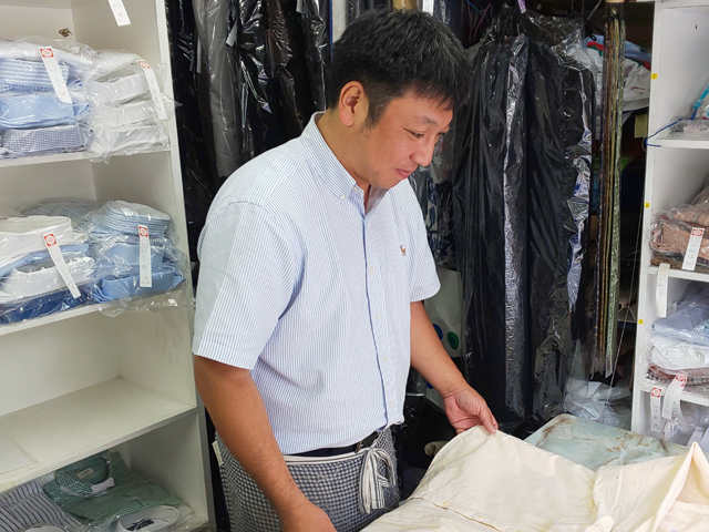 クリーニング師による受け渡し